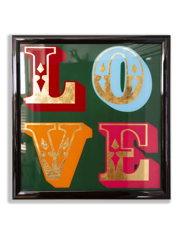Vintage love sign with 22ct gold leaf on green background in gloss black frame